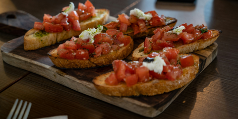 Authentic Italian Bruschetta with Juicy Tomatoes and Roasted Garlic