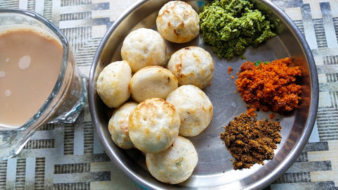 white round food on stainless steel plate