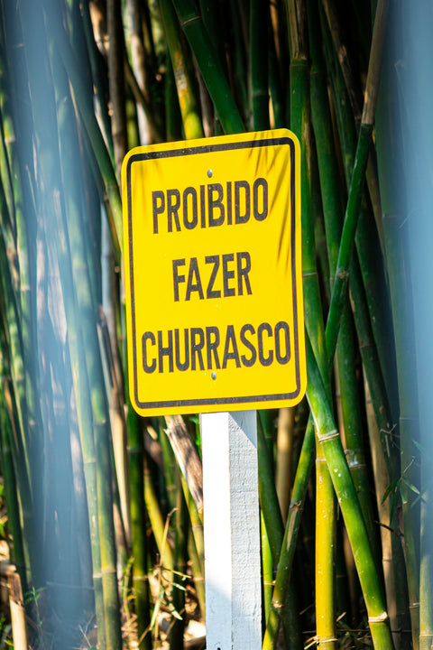 yellow and black no smoking sign